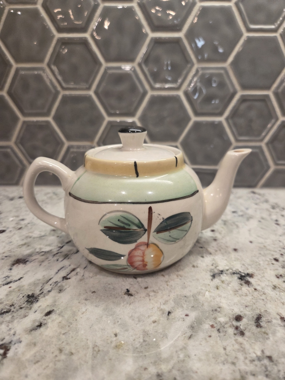 Hand-Painted Ceramic Teapot with Green and Yellow Fruit Motif